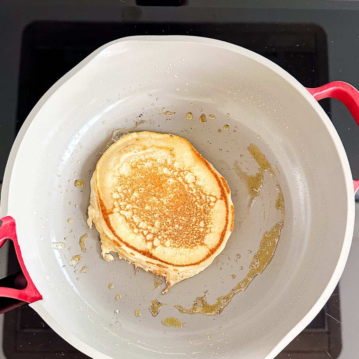 cooked pancake in a frying pan