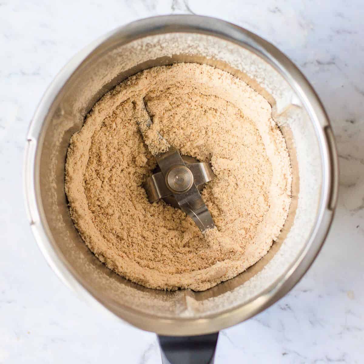 Oat and almond flour in a Thermomix bowl.