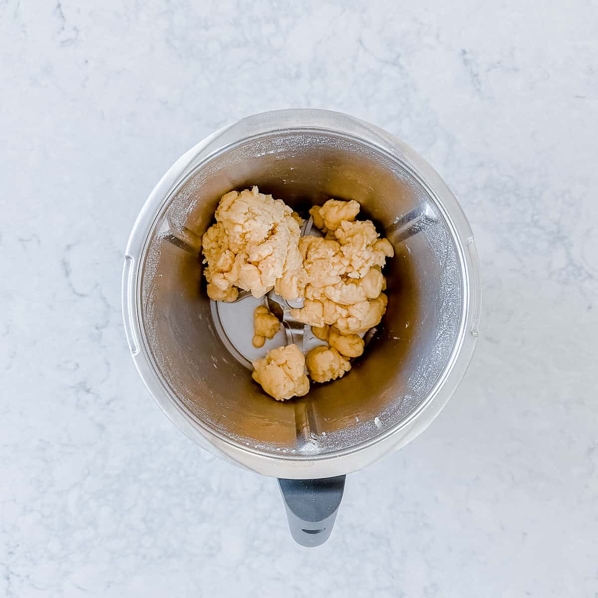 Shortcrust pastry being made in a Thermomix.