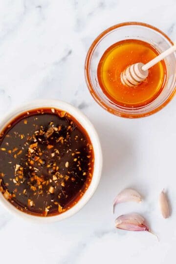 Overhead image of honey soy sauce with honey and garlic.