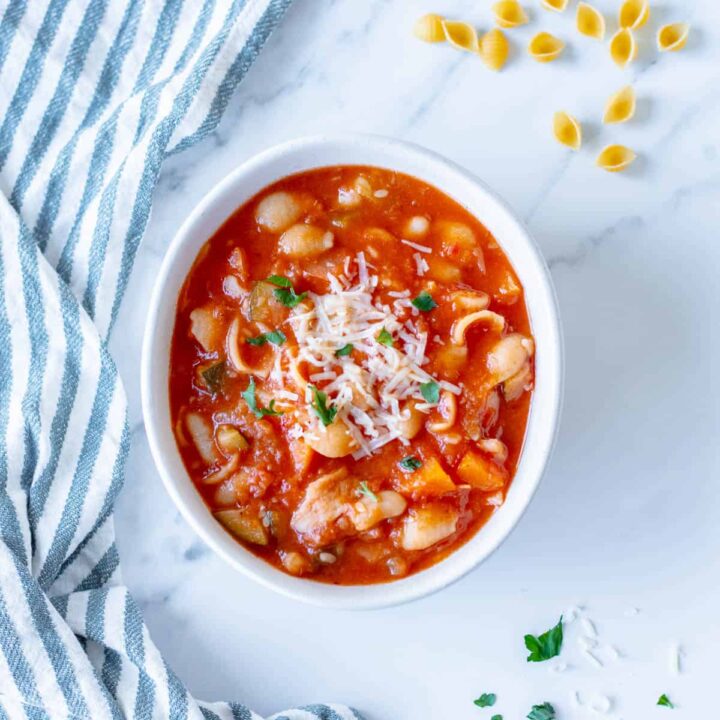 Homemade Minestrone Soup in a white bowl.